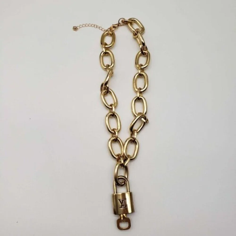 Authentic Louis Vuitton Lock and Key Gold w/Unbranded Geometry Cuban Style Chain